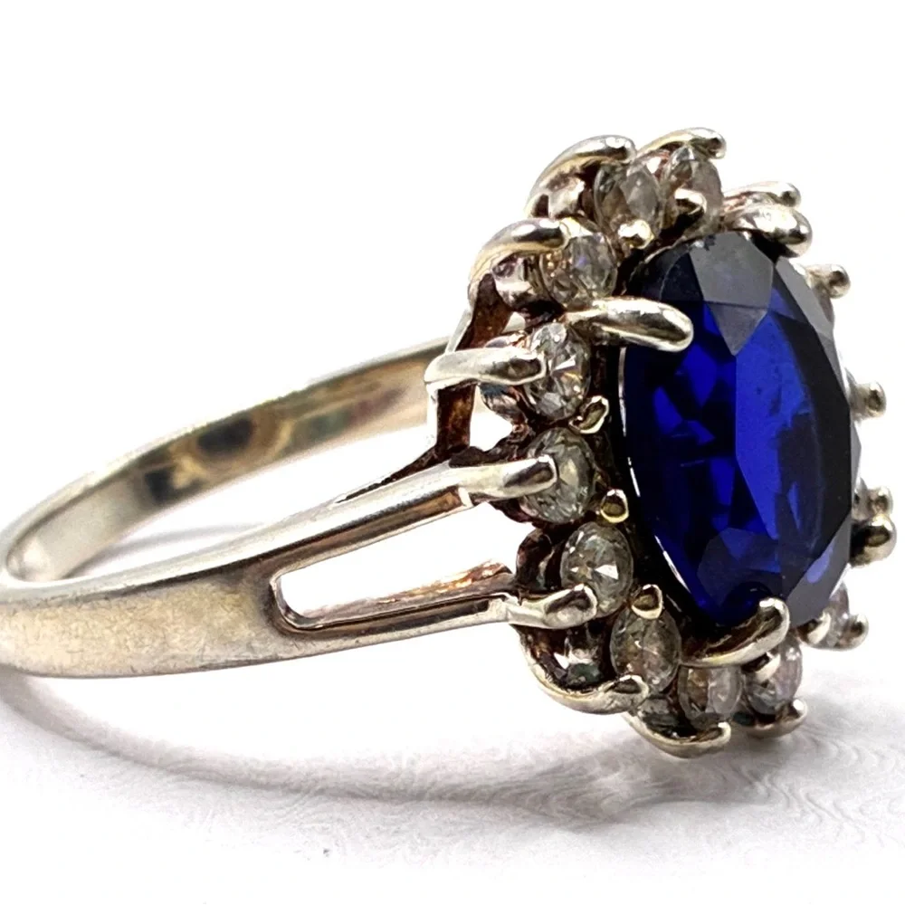 VTG Signed JC Oval Cut Cubic Zirconia Sapphire with Halo of CZ’s In Silver Tone